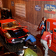 Matthew needed a break with a cold drink while Boxster inspects the red Mustang